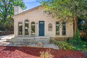 View of front of house with a patio