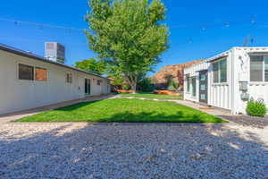 View of yard with central AC