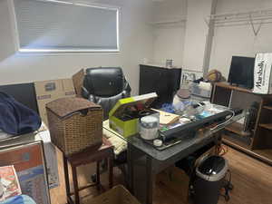 Home office featuring hardwood / wood-style floors