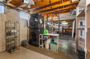 Basement with stacked washer / dryer