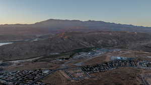 Property view of mountains with a water view