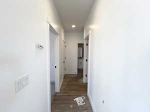 Corridor featuring hardwood / wood-style floors