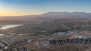 Property view of mountains with a water view