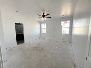 Unfurnished room featuring ceiling fan