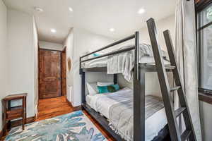 Bedroom featuring hardwood / wood-style flooring