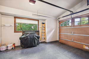 Garage featuring a garage door opener