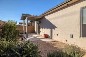 Exterior space with a patio and a pergola