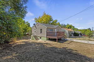 Rear view of house with a deck