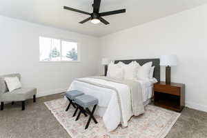 Bedroom with carpet and ceiling fan