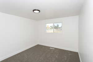 View of carpeted empty room