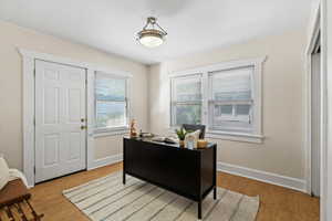 Office area featuring light wood-type flooring