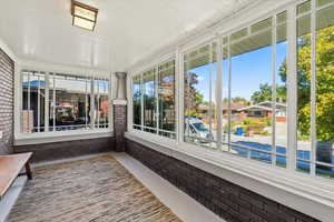 Unfurnished sunroom with a healthy amount of sunlight