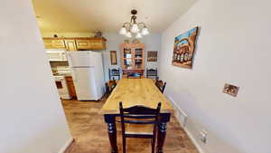 Dining room featuring a notable chandelier