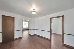 Formal dining room looking into master bedroom and formal living room.