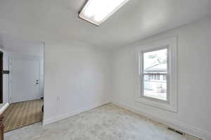 Kitchen dining area also has a formal dining room.