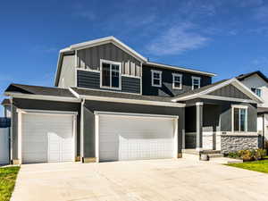 View of front of property with a garage