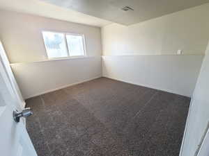 Great fourth bedroom or private office / flex room off the lower level family room