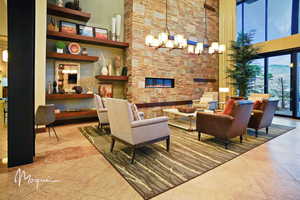 Brio community center fireplace and lounge area.