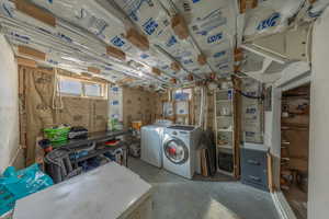 Basement with washer and clothes dryer