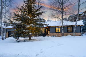 View of front of property featuring a garage