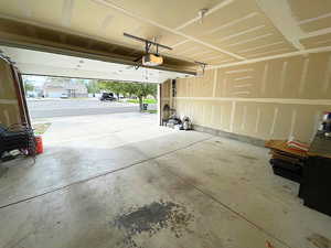 Garage featuring a garage door opener