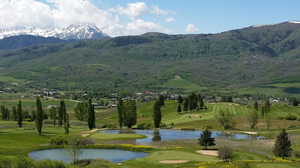 Wolf Creek Golf Course with view of Snowbasin and wasatch back.