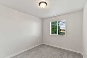 View of carpeted empty room