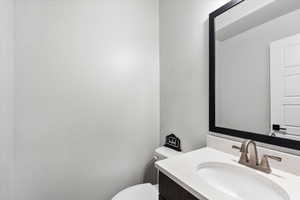 Bathroom with vanity and toilet