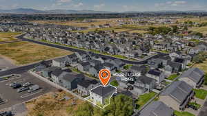Aerial view of residential area with a mountain backdrop