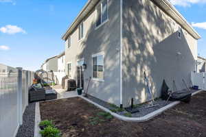 View of side of property with a patio