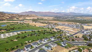 Bird's eye view featuring a water and mountain view