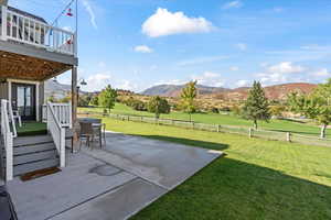 Exterior space featuring a deck with mountain view