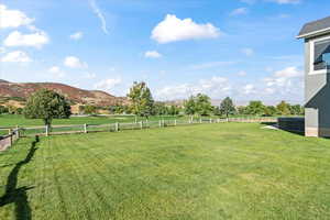 View of yard featuring a mountain view and a rural view