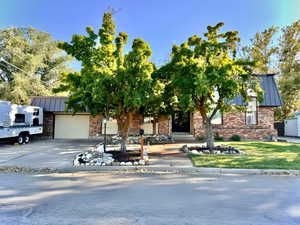 View of front of home with a garage