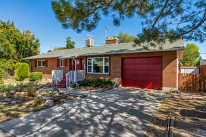 Single story home featuring a garage