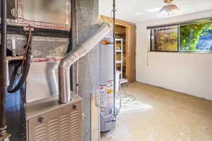 Utilities with water heater and heating unit and storage