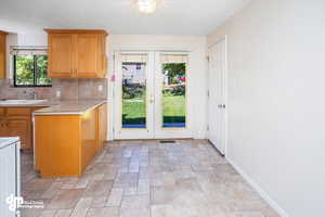 Dining area featuring decorative French doors.