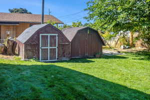 View of yard with a shed