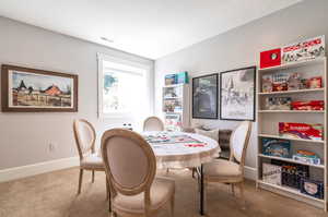 Dining space featuring carpet floors