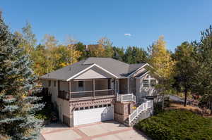 View of front of property with a garage