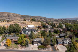 Birds eye view of property featuring a mountain view