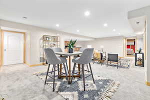 View of carpeted dining space