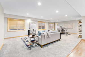 Living room with light wood-type flooring