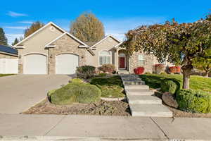 Ranch-style home featuring a garage