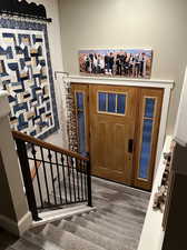 Entrance foyer featuring dark hardwood / wood-style flooring