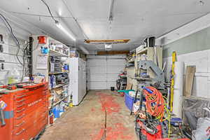 Garage featuring a garage door opener