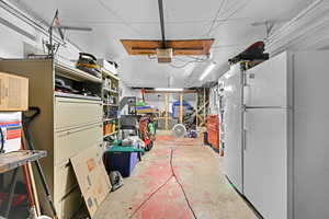 Interior space with white fridge