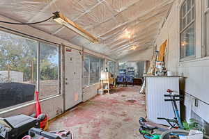 Sunroom with lofted ceiling and plenty of natural light