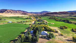 Drone / aerial view featuring a rural view and a mountain view