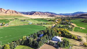 Drone / aerial view with a rural view and a mountain view